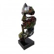 Statue en résine sur socle visage de femme multicolore splash fond noir le signe du silence 43 cm